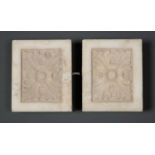 A pair of carved white marble chimney piece end blocks, 12cm wide x 9.5cm high (2)Condition