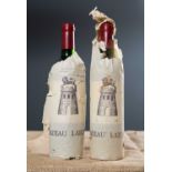 Two bottles of Chateau Latour 1986 (2)Condition report: Still in original paper. Bought en primeur