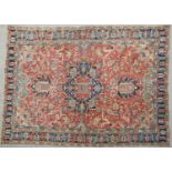 A Persian multicoloured carpet with geometric decoration, 331cm x 255cmCondition report: Worn in