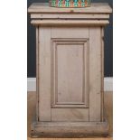 A 19th century grey painted pine sculpture plinth, with panelled sides 56cm wide x 86cm high.