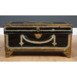 An early 19th century studded brass and leather bound camphor wood trunk with brass carrying handles