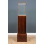 A five glass display cabinet on two-tiered wooden plinth base, 38cm wide x 38cm deep x 178cm