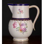 A late 18th century Royal Crown Derby ale jug, with blue and gilt decoration and central floral