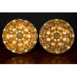 A pair of bronze empire style floral rosette curtain tie backs, 15cm diameter x 20cm deep to fitting