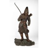 A bronze sculpture of a Japanese warrior holding his bow in one hand and a small bird in the