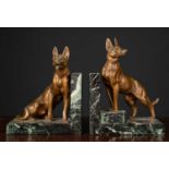 A pair of Alsatian book ends, gilt spelter and marble, 5cm wide x 11cm deep x 20cm high, (2).