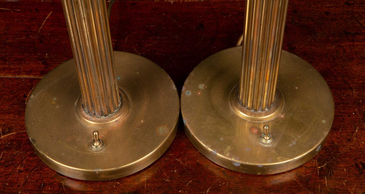 A pair of circular brass table lamps with fluted columns and circular bases, 59cm high to the - Image 2 of 2