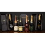 Three bottles of Vintage Moet Champagne, one 2000 and two 2004, a bottle of Pink Champagne Jeanmaire