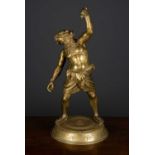 An ormolu cast figure of Silenus, stamped G Pollice, Napoli, on a circular engraved base, Silenus