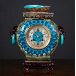 A French Viellard Bordeaux Pottery mantle clock, the chinoiserie style case surmounted by a shell,