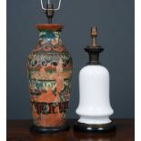 A 19th century white glass bodied table lamp possibly previously an oil lamp, with turned ebonised