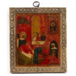 An antique Russian icon painted with the Domination of The Virgin on panel with gilt metal