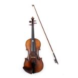 A violin with single piece back and with label printed 'F.E. Stamm Estebrugge 1838', together with