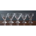 A group of five similar styled 19th century wine glasses or rummers, the largest 10cm diameter and