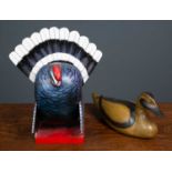 A carved wooden and painted Turkey, 33cm high, together with a painted wooden decoy type duck 35cm