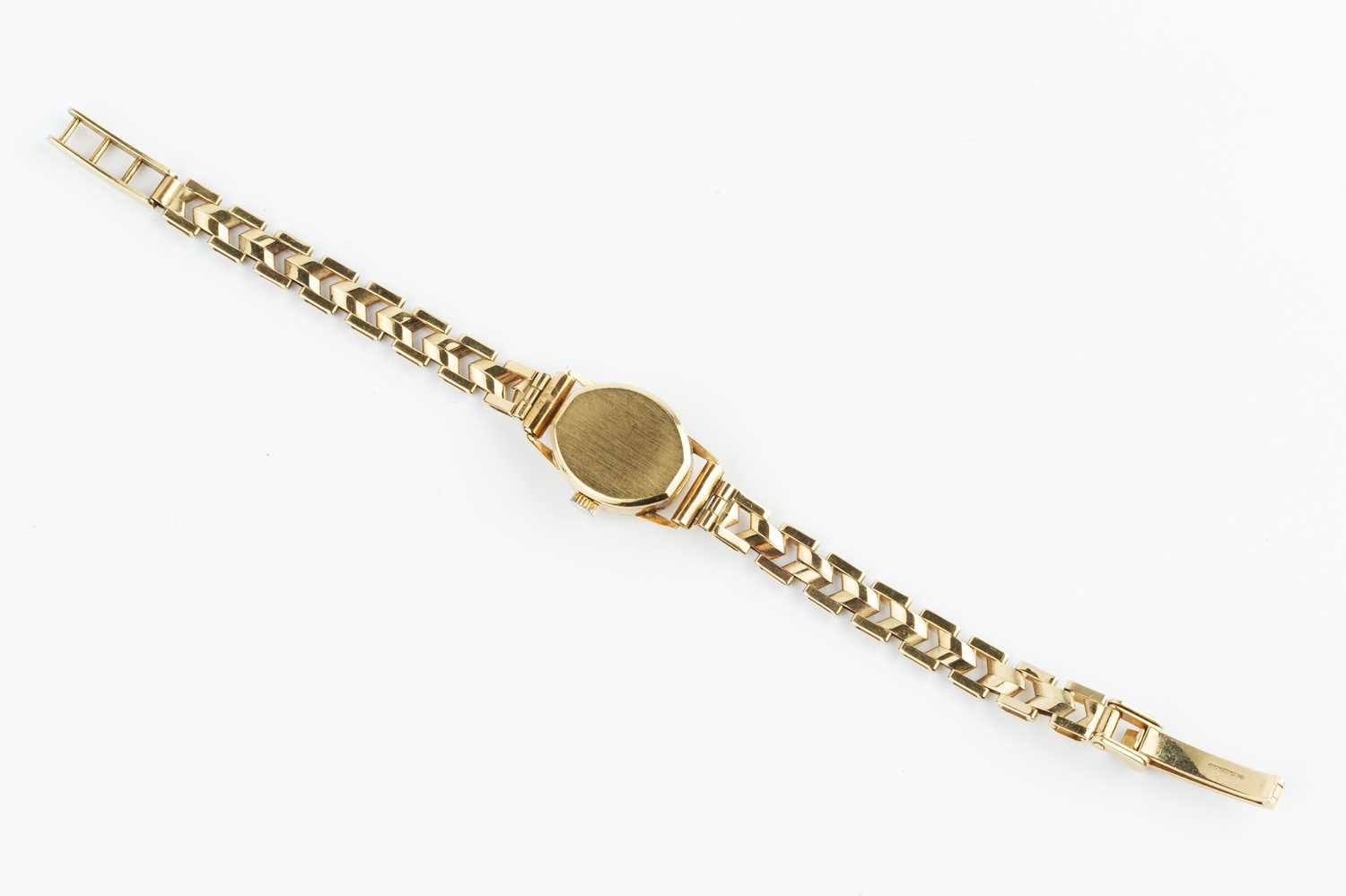 A lady's 9ct gold bracelet watch by Rotary, the oval silvered dial with baton markers, to a quartz - Image 2 of 3