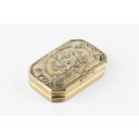 An early 19th century silver gilt snuff box, of rectangular form with canted corners, the hinged