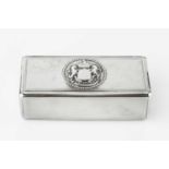 A 19th century Continental silver rectangular box, the hinged lid relief decorated with a coat of