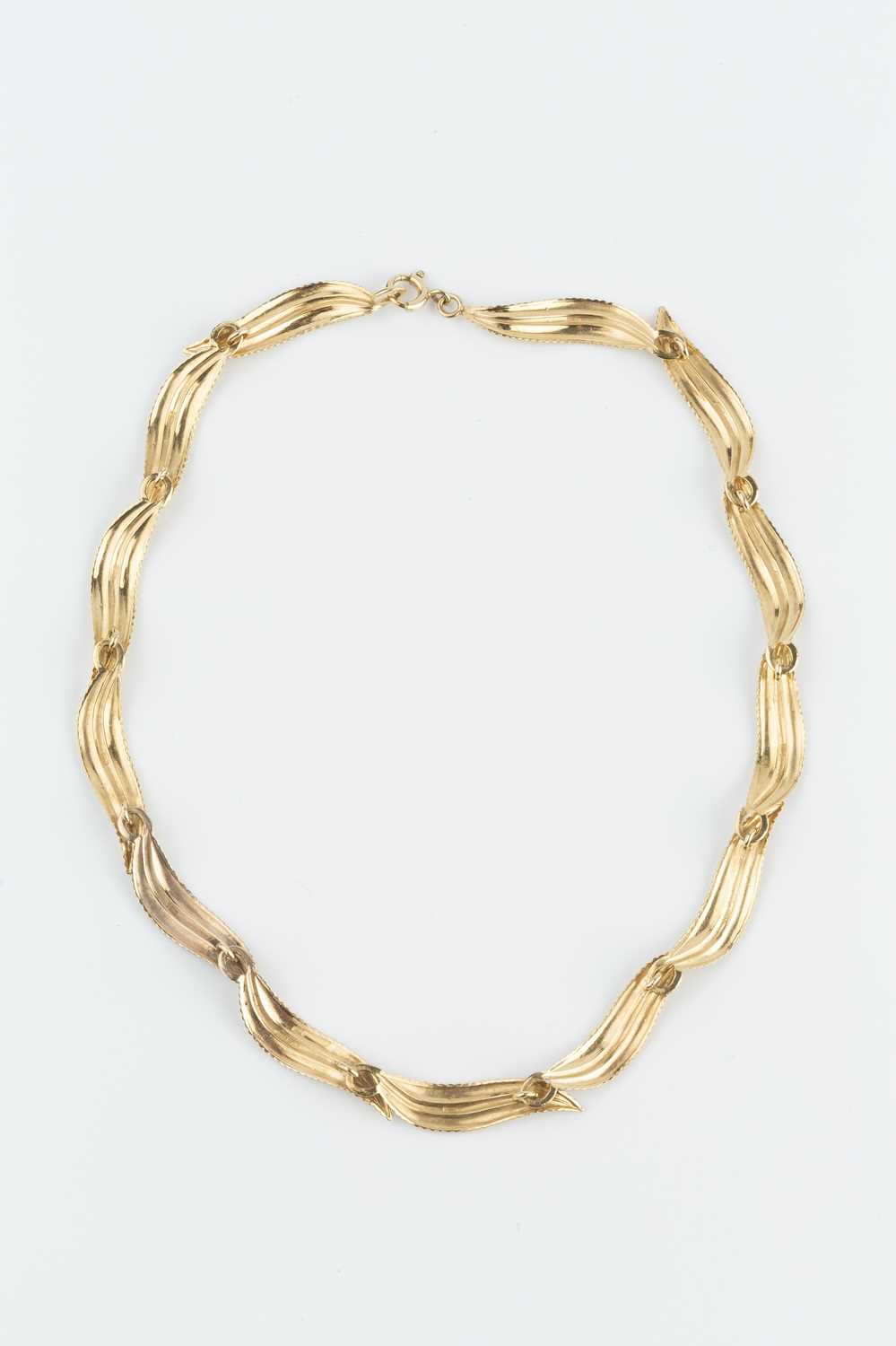 A 9ct gold collar necklace, designed as a series of repeating leaf panels, maker's mark EFC, - Image 3 of 3