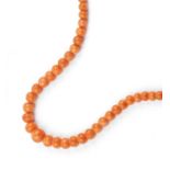 A coral bead necklace, comprising a single strand of coral corallium rubrum beads, graduating from