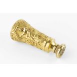 A 19th century French gold desk seal, the handle relief decorated with classical figures, birds