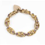 An amethyst set fancy-link bracelet, designed as a series of oval openwork panels, each accented