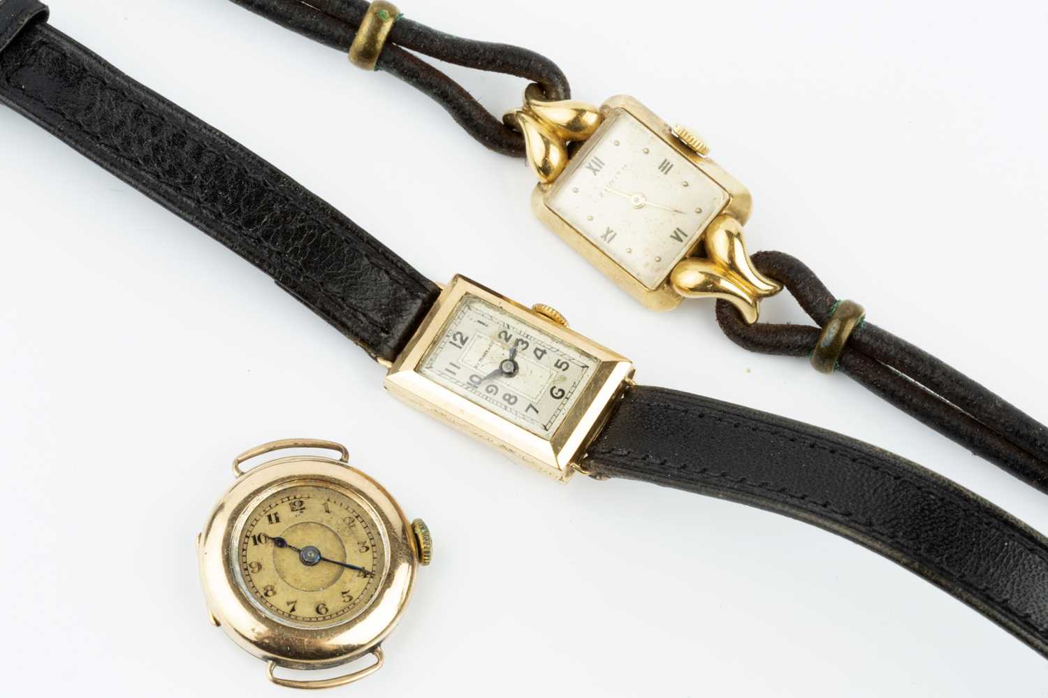 Two wristwatches, the first by Zenith, with rectangular silvered dial and jewelled manual