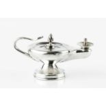 An Edwardian silver novelty cigar lighter, in the form of a Roman oil lamp with serpent handle, by