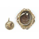 A 19th century hairwork memorial pendant, with glazed hairwork compartment and engine-turned