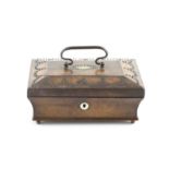 A 19th century French figured walnut necessaire, of sarcophagus form, the lid with steel studwork