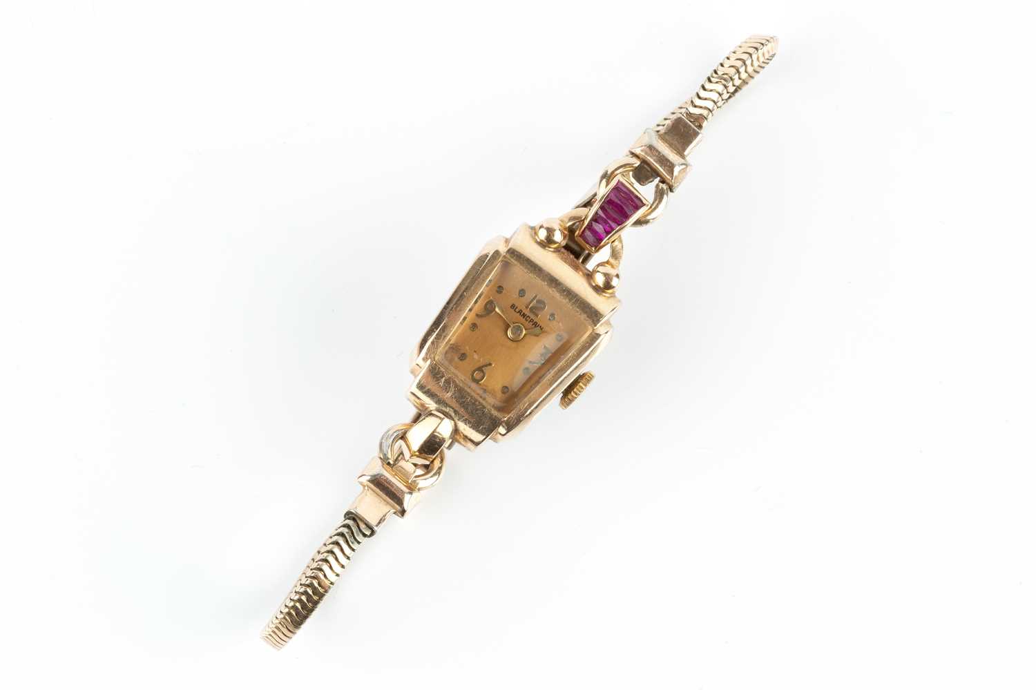 A lady's gem set bracelet watch by Blancpain, the trapezoid-shaped gilt dial with Arabic quarters