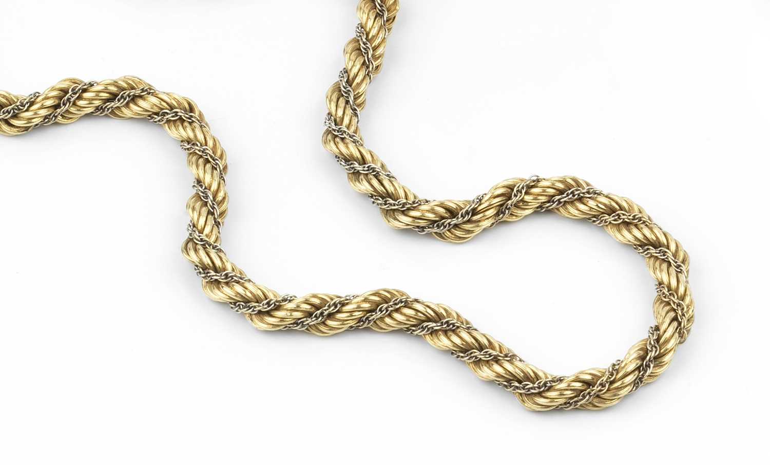 A two colour precious metal fancy-link chain, of ropetwist design, the clasp stamped '750', length