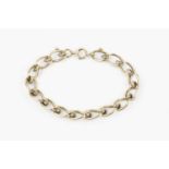 A 9ct gold fancy curb-link bracelet, with part ropetwist decoration, length 21.5cmCondition