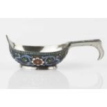 A Russian silver and enamel kovsh, with angular handle, decorated with stylised flower heads and