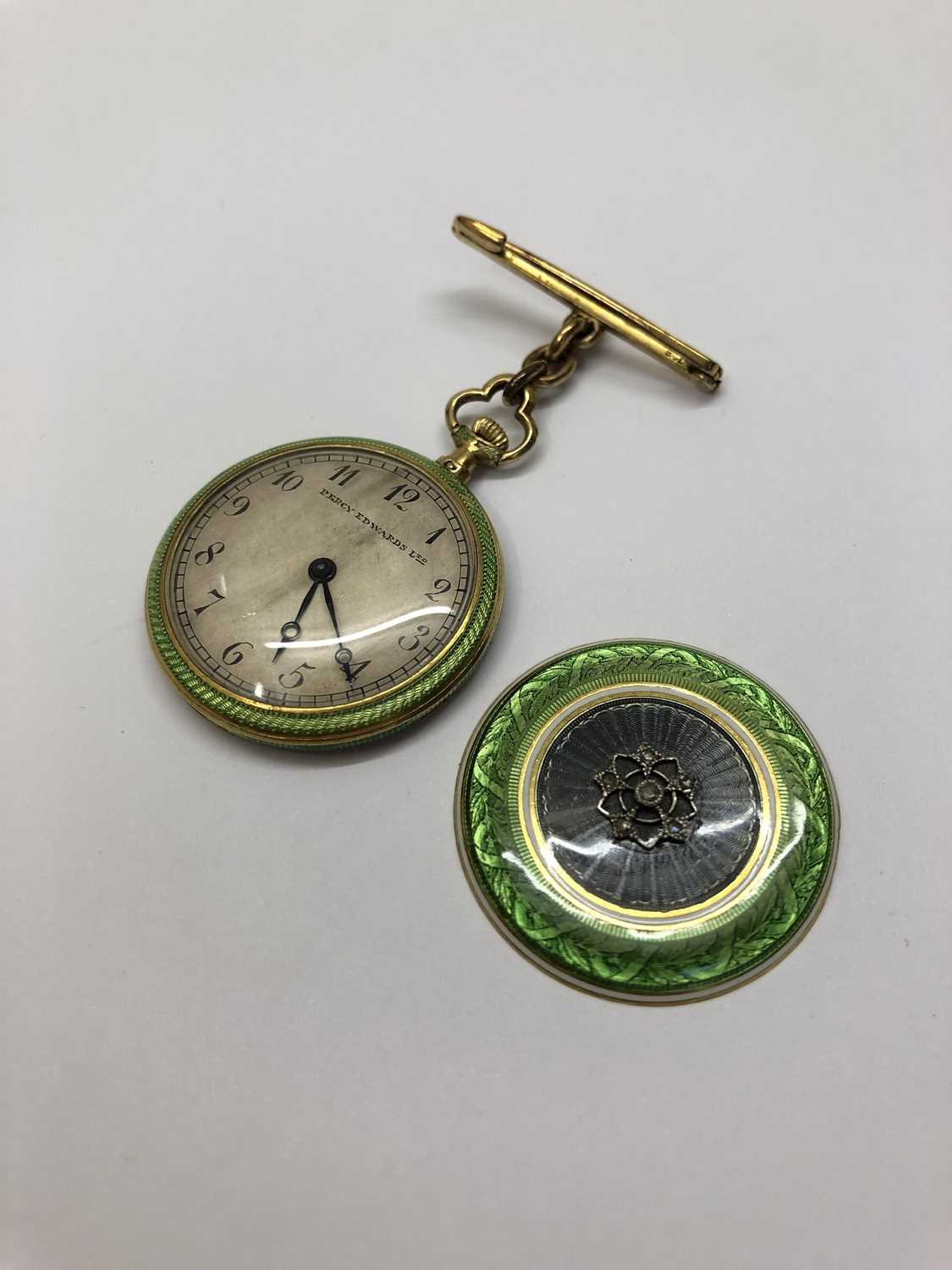 An early 20th century enamel and diamond set fob watch, the circular silvered dial with stylized - Image 3 of 5