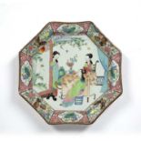 Octagonal famille rose charger Japanese, circa 1900 painted with three ladies seated and standing