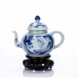 Blue and white teapot and cover Chinese, 18th/19th Century decorated to the exterior with a figure