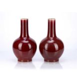 Pair of sang de bouef bottle vases Chinese, 20th Century each, 32cm highCondition report: Each has a