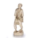 Ivory okimono carved as a farmhand Japanese, late Meiji (1890-1900) with corny ears, his bag held by