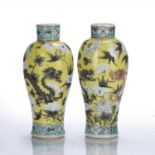 Pair of yellow ground Canton vases Chinese, 19th Century each with a dragon design, 24cm