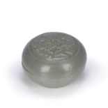 Celadon cosmetic pot and cover Chinese, Song Dynasty with relief dragons to the cover, 14cm diameter