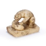 Carved marble mythical lion Chinese, Tang dynasty the crouched animal, with its front paws resting
