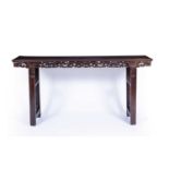 Large carved rosewood altar or painting table Chinese, 19th Century the upper surface consisting