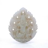 White jade pendant Chinese carved with a seated buddha, on a lotus base, set against a pierced and