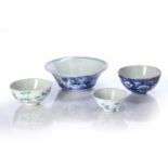 Group of four bowls Chinese to include a foliate decorated bowl with three lines of inscription,