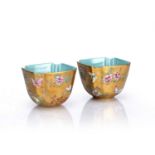 Pair of square gilt and turquoise cups Chinese each delicately painted with butterflies and flowers,