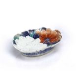 Nabeshima porcelain oval dish Japanese, early 19th Century modelled as red and white glazed peony