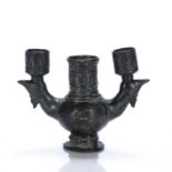 Bronze candlestick Persian with stylised animal head ends, 10cm highCondition report: Green patina