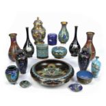 Group of cloisonne pieces Chinese and Japanese including a pair of red ground vases, 23cm high, a