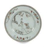 Porcelain 'encre de chine' plate Chinese, 18th Century painted with a lady carrying a basket and a